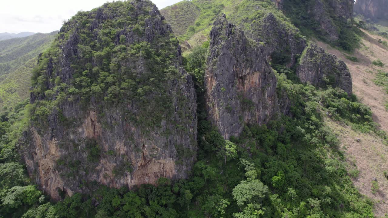 Drone view over green hills of San Juan de los Morros, serene and vast