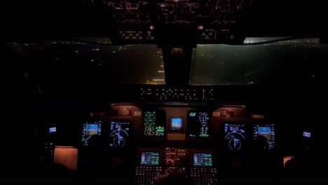 exclusive night view of a jet cockpit during a real night landing at palma de mallorca airport