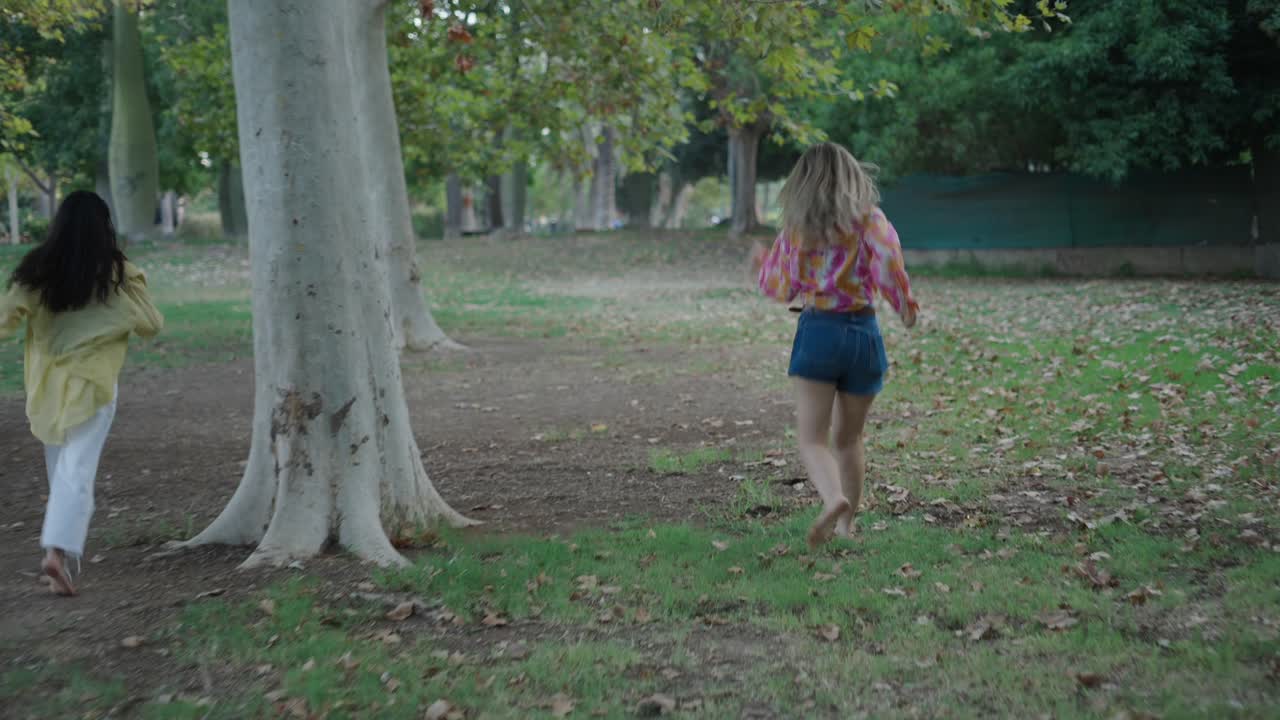 Two Women Running in a Park