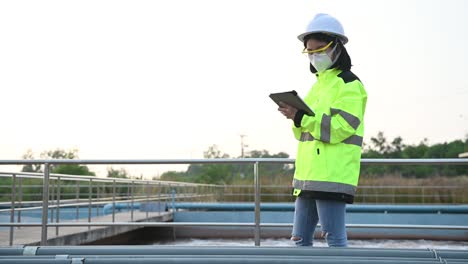 environmental engineers work at wastewater treatment plants