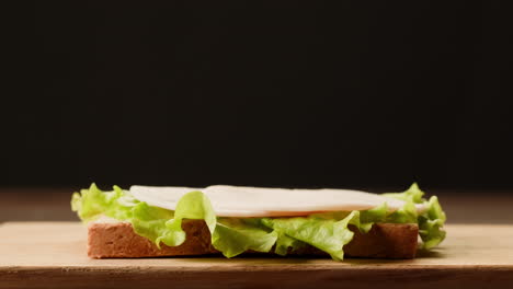 making a chicken salad sandwich