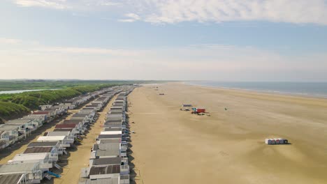 aerial view flying over rows of beach houses