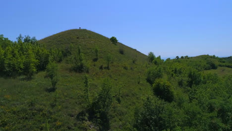 the sea is found behind a hill