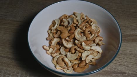 zoom out of the cashew nuts in a bowl, a healthy source of protein and energy food