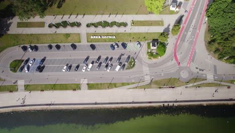 Arka-Gdynia-Square,-Poland-with-parking-lot-from-above,-aerial-view