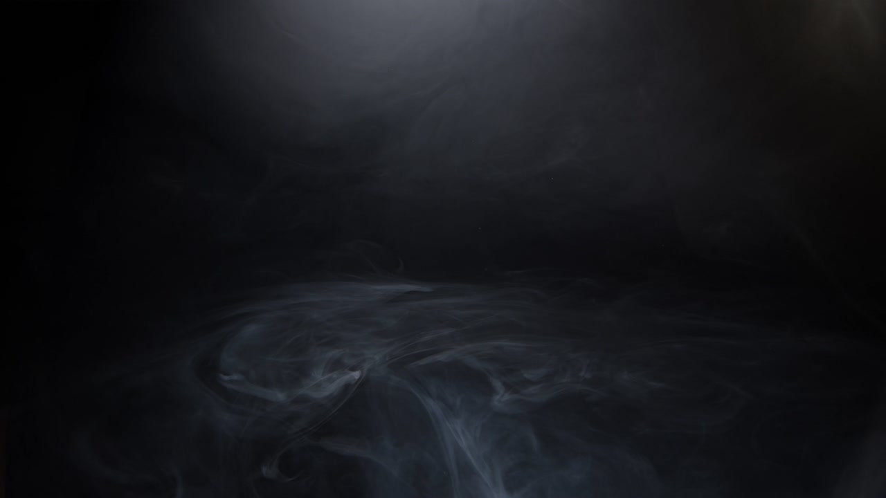 Haze smoke swirling on black background 06