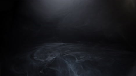 haze smoke swirling on black background 06