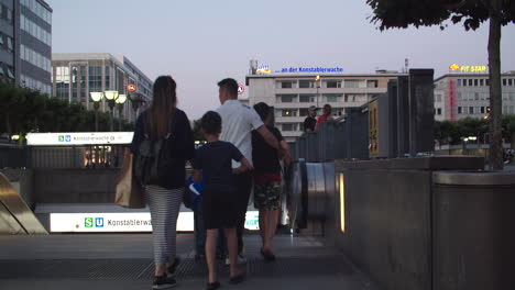 people walking entering in underground metro in frankfurt am main, static, night