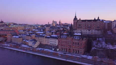 stockholm south island drone pull away view at evening time