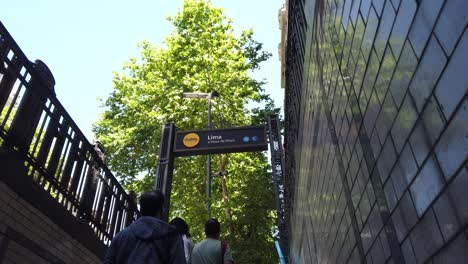 underground subway exit pov at buenos aires city, people go upstairs subway, metro entrance