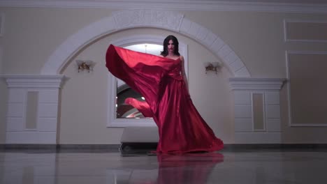 woman in red formal gown