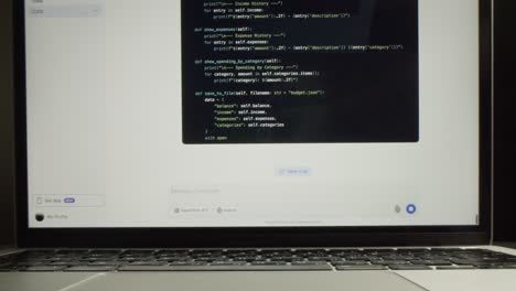 coding on a laptop