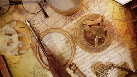 Vintage-style-travel-and-adventure.-Vintage-old-compass-and-other-vintage-items-on-the-table.