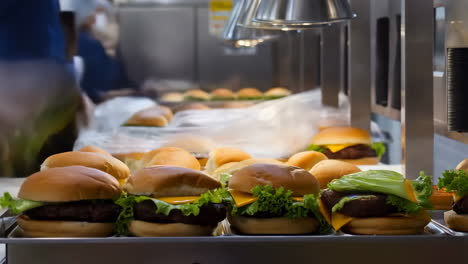 burgers being prepared in a kitchen