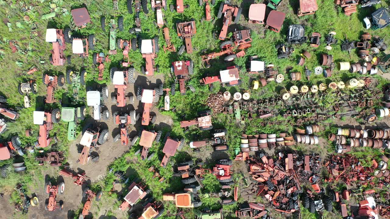 Aerial View of a Junkyard Filled with Old Farm Equipment