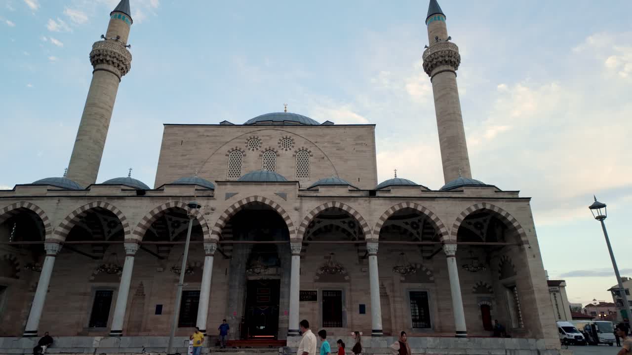 Close-up view of the Selimiye Mosque minarets in Konya, capturing intricate Islamic architectural details against the sky