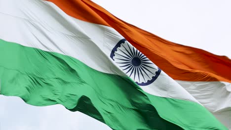 india flag flying high with pride flag fluttering india independence day and republic day of india blue sky