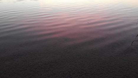 staffelsee lake in germany bavaria recorded in the afternoon twilight flying over the lake with a dji drone in 4k with nd filters