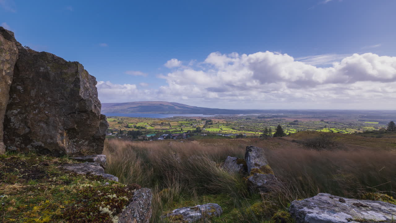 Scenic Mountain Landscape with Rolling Hills and Blue Sky