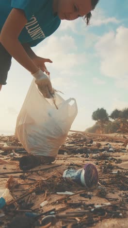 engaging volunteers unite to clean polluted beach in sunny afternoon