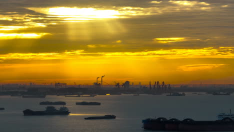 sunset over container ship import export business commercial port in deep sea load and unloading cargo by crane for distributing goods