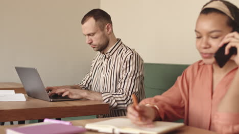 businesspeople working in cafe