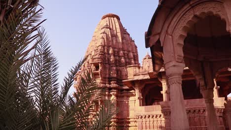 red-stone-ancient-hindu-temple-architecture-from-unique-angle-at-day