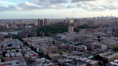 Super-crisp-aerial-trucking-shot-across-Upper-Manhattan-New-York-City-with-nice-parallax-of-the-rising-buildings-at-golden-hour