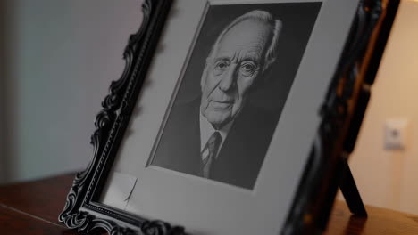 portrait of an elderly man in a frame