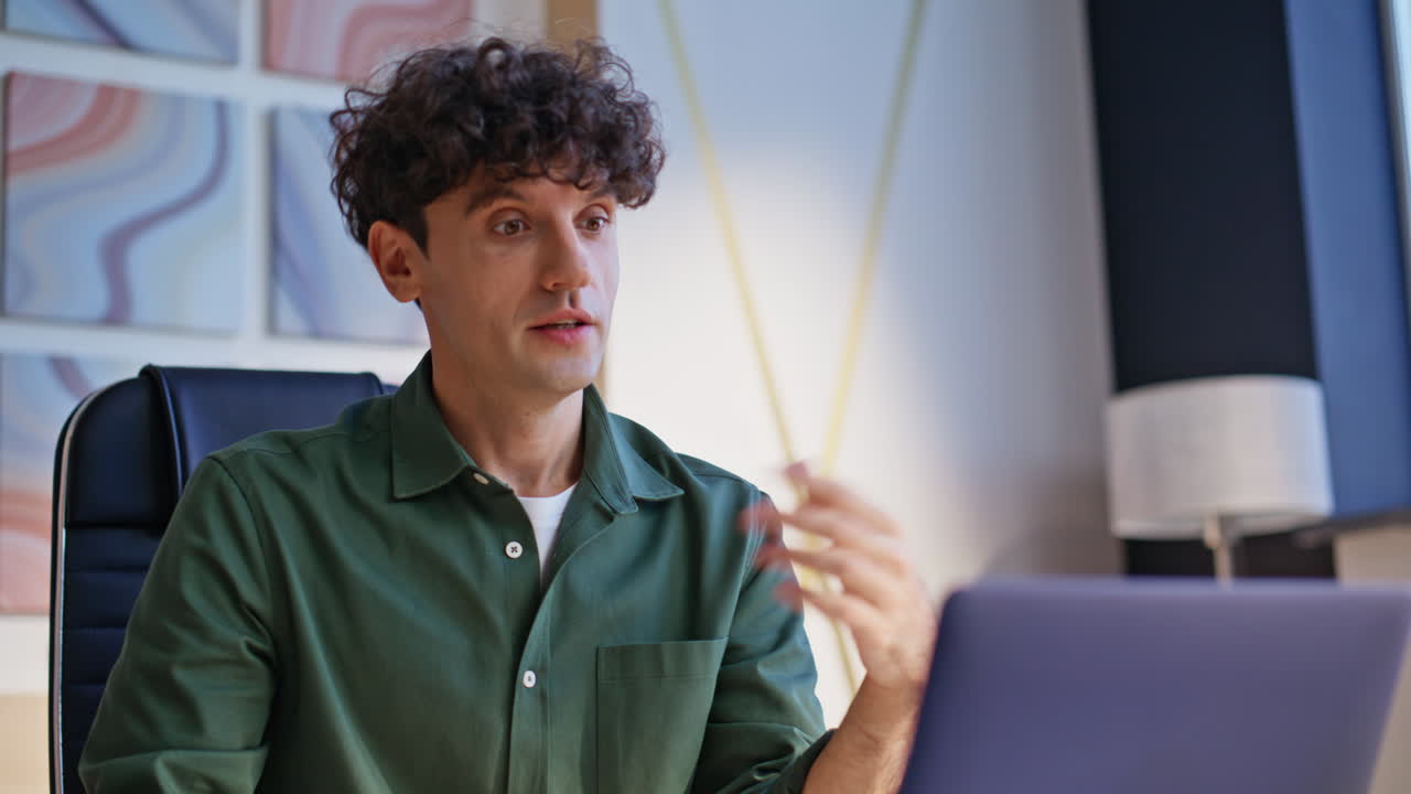 Freelancer discussing work virtual conference sitting modern workplace closeup