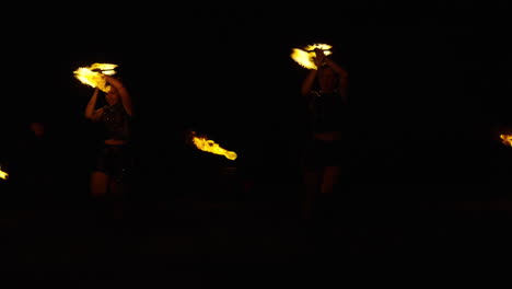 fire jugglers at night