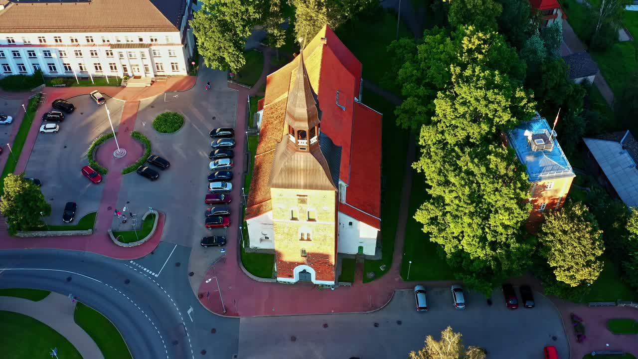 St Simon's Church and town square, and city council in Valmiera, Latvia in aerial view