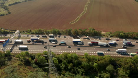 aerial slider shot over traffic on the m25 london motorway