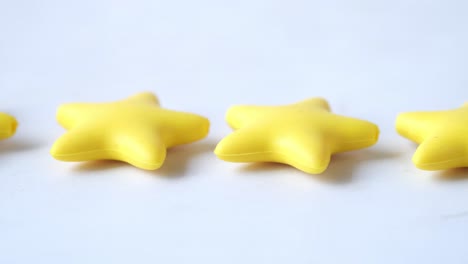 three yellow star-shaped decorations