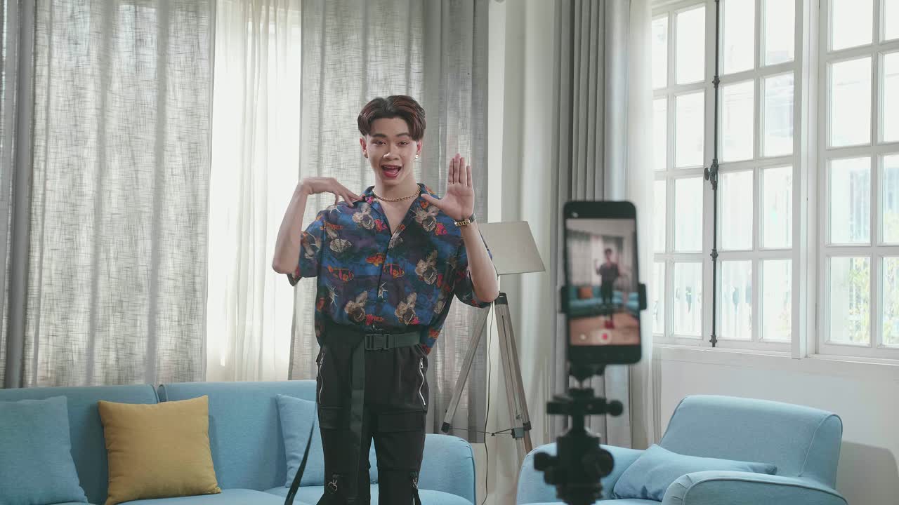 Man Recording TikTok Video in Living Room