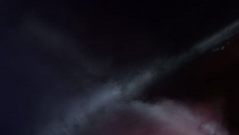 lights canyons and smoke moving in the stage of a concert