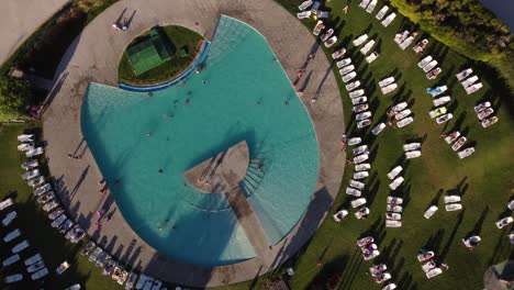 people in swimming pools in club de amigos at buenos aires city in argentina