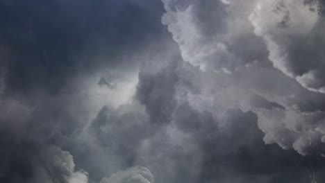 dark clouds and thunderstorm among cumulonimbus in the sky