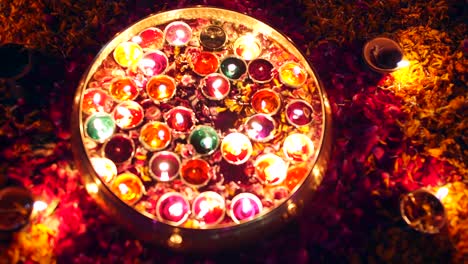 indian family decorating home for traditional diwali festivities