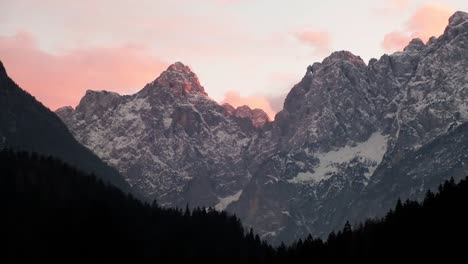 beautiful alpine lake jasna near kranjska gora, slovenia during winter at sunset