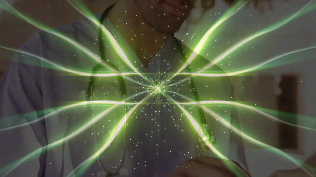 Male doctor leaning with stethoscope in clinic, showing animated green light beams and sparkles