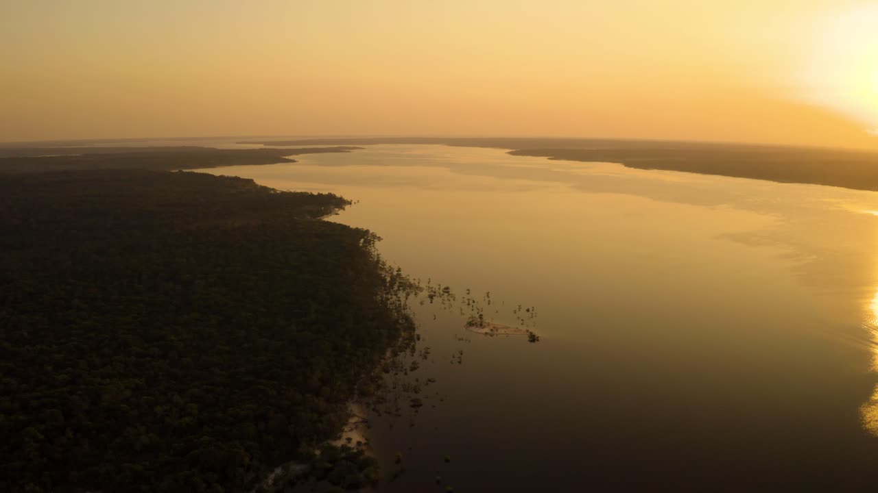 An aerial view of the Amazon River in Brazil at sunrise