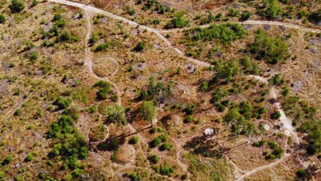 Old-stone-circles-in-the-open-landscape-of-Leśno,-Chojnice-County-northern-Poland--aerial