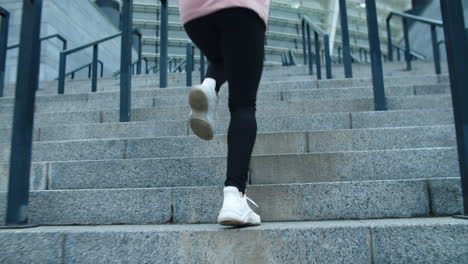 fitness girl running upstairs