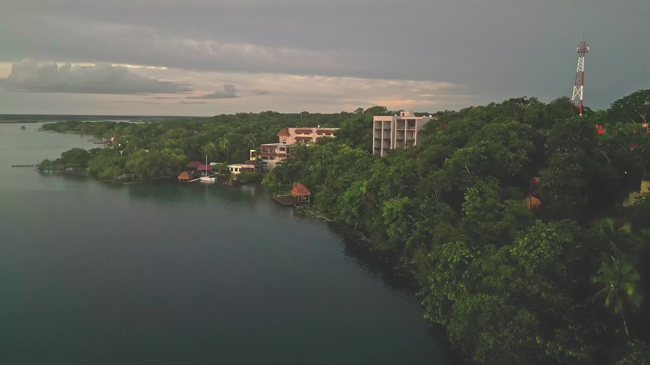 Lakeside Amainah Bacalar Luxury Boutique Hotel In The Bacalar Lagoon In Mexico. Aerial Ascending Shot