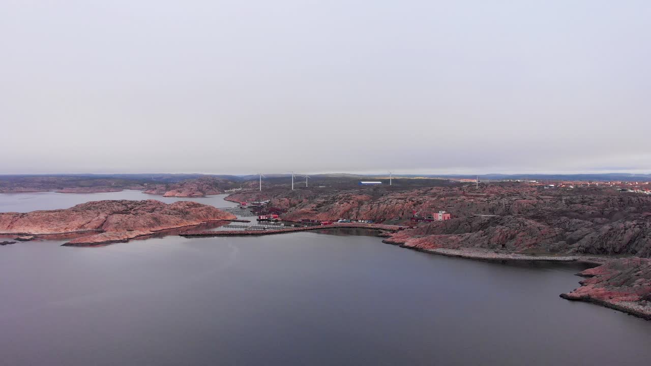 The beautiful rocky shores of Lysekil, Sweden by the port - aerial
