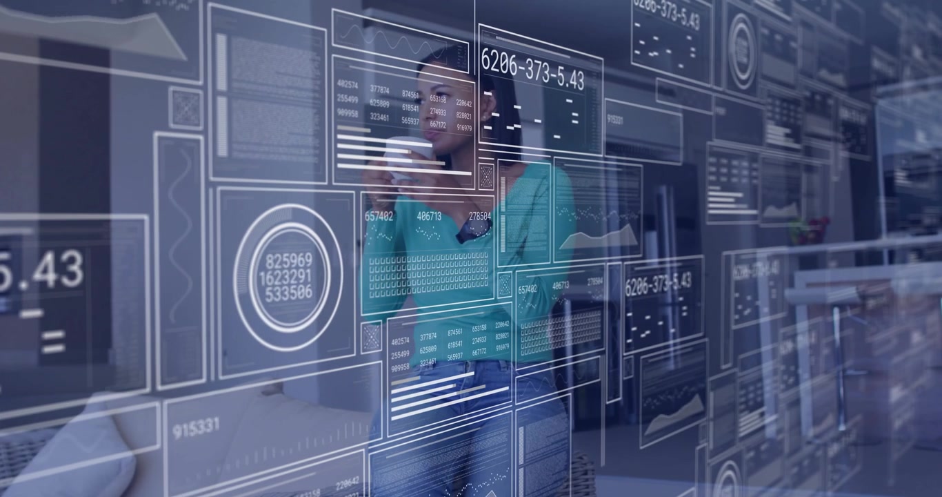 Woman holding mug with digital panels appearing and updating graphs while studying technology data