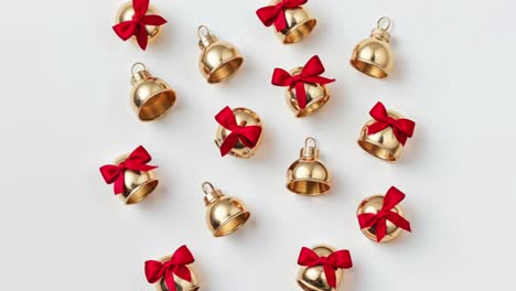 gold bells with red bows