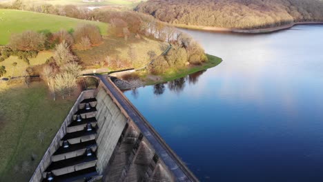 aerial of high walled concrete dam at wimbleball lake