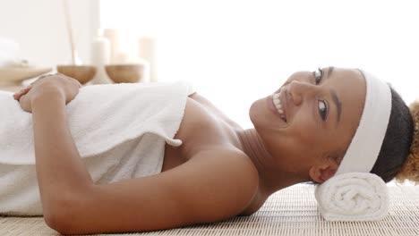 smiling female enjoying spa therapy